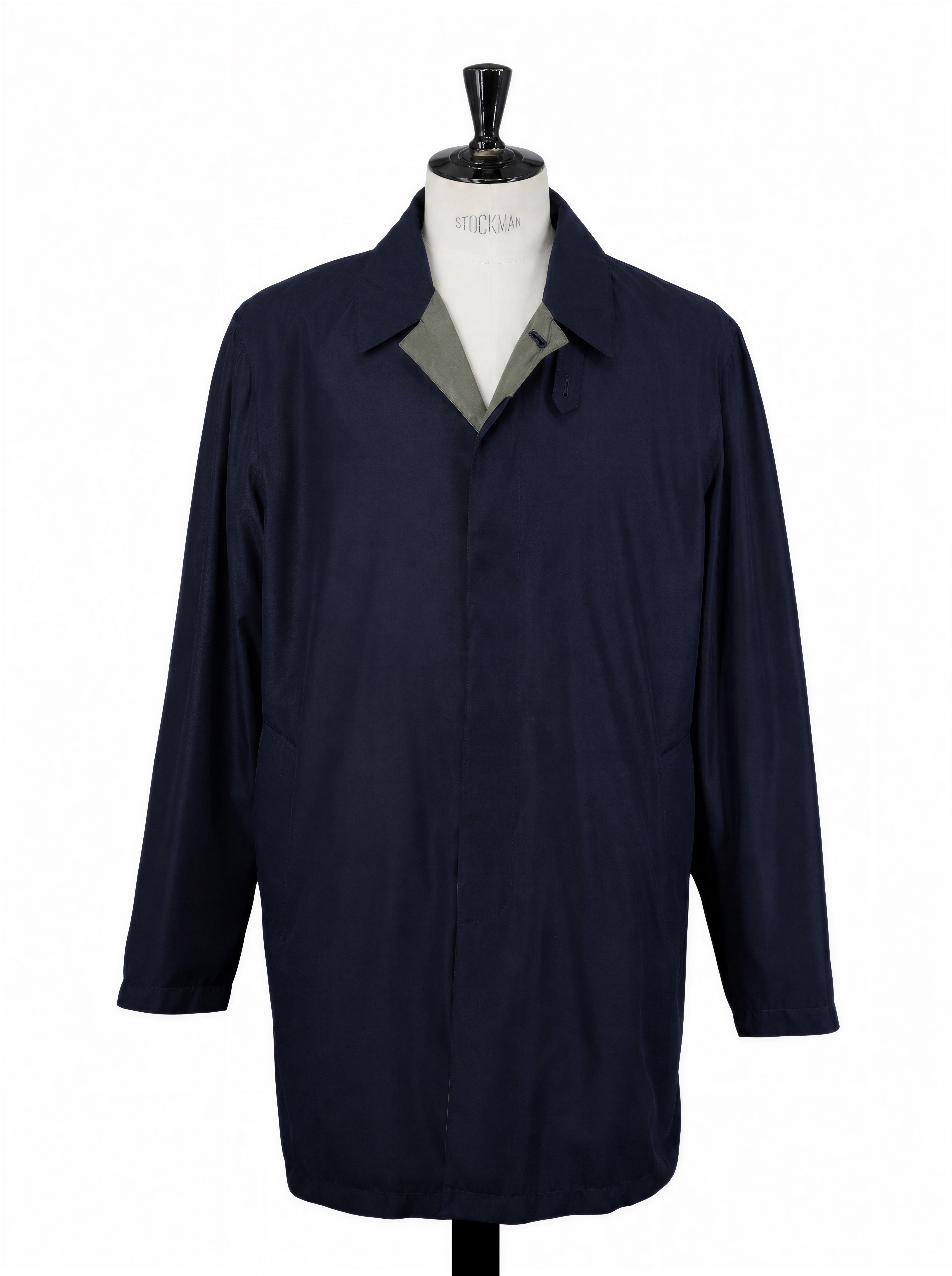 A navy blue utility jacket displayed on a white mannequin torso against a plain white background.