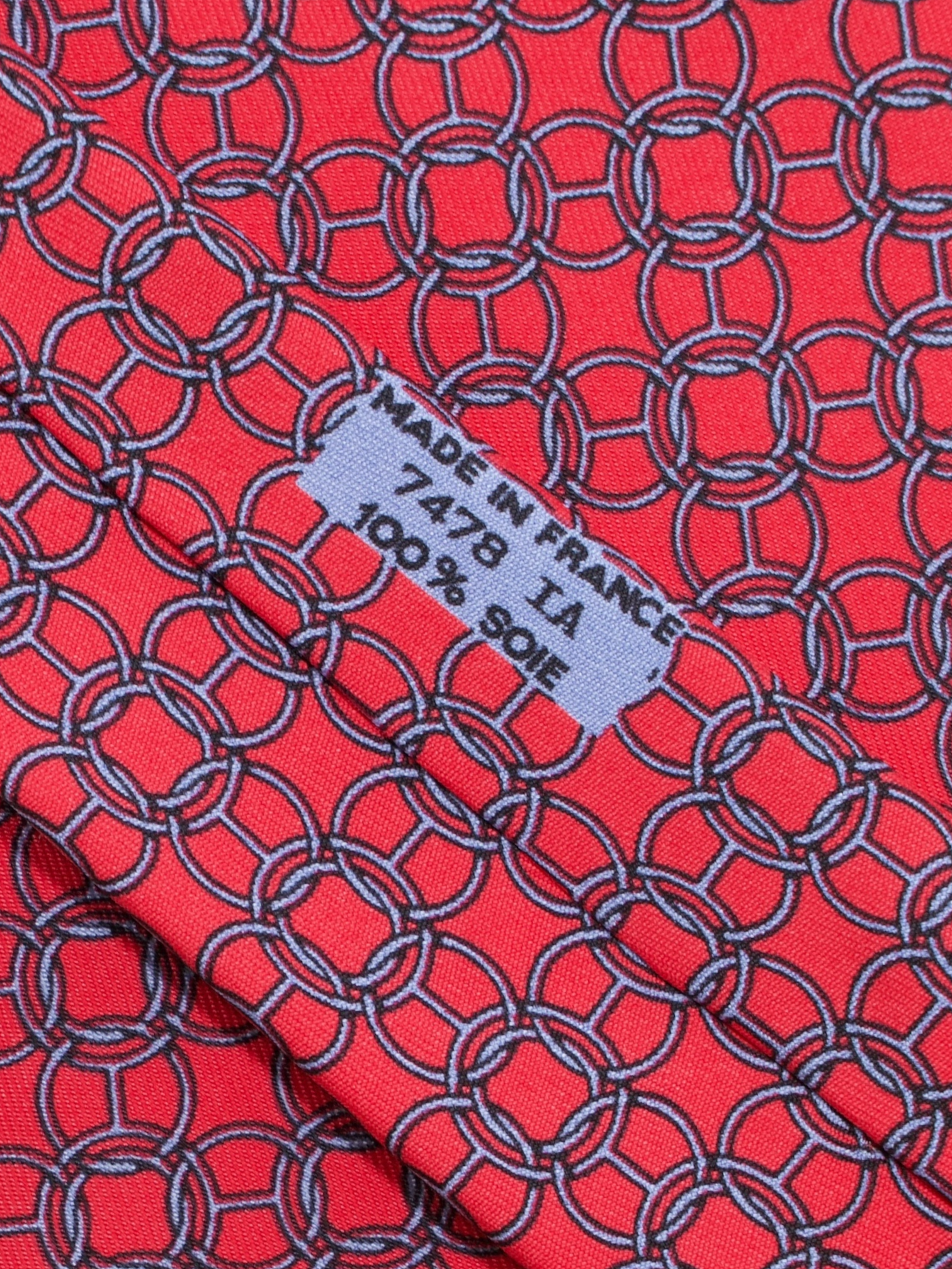 Hermès Coral Red Silk Chain-Ring Pattern Tie
