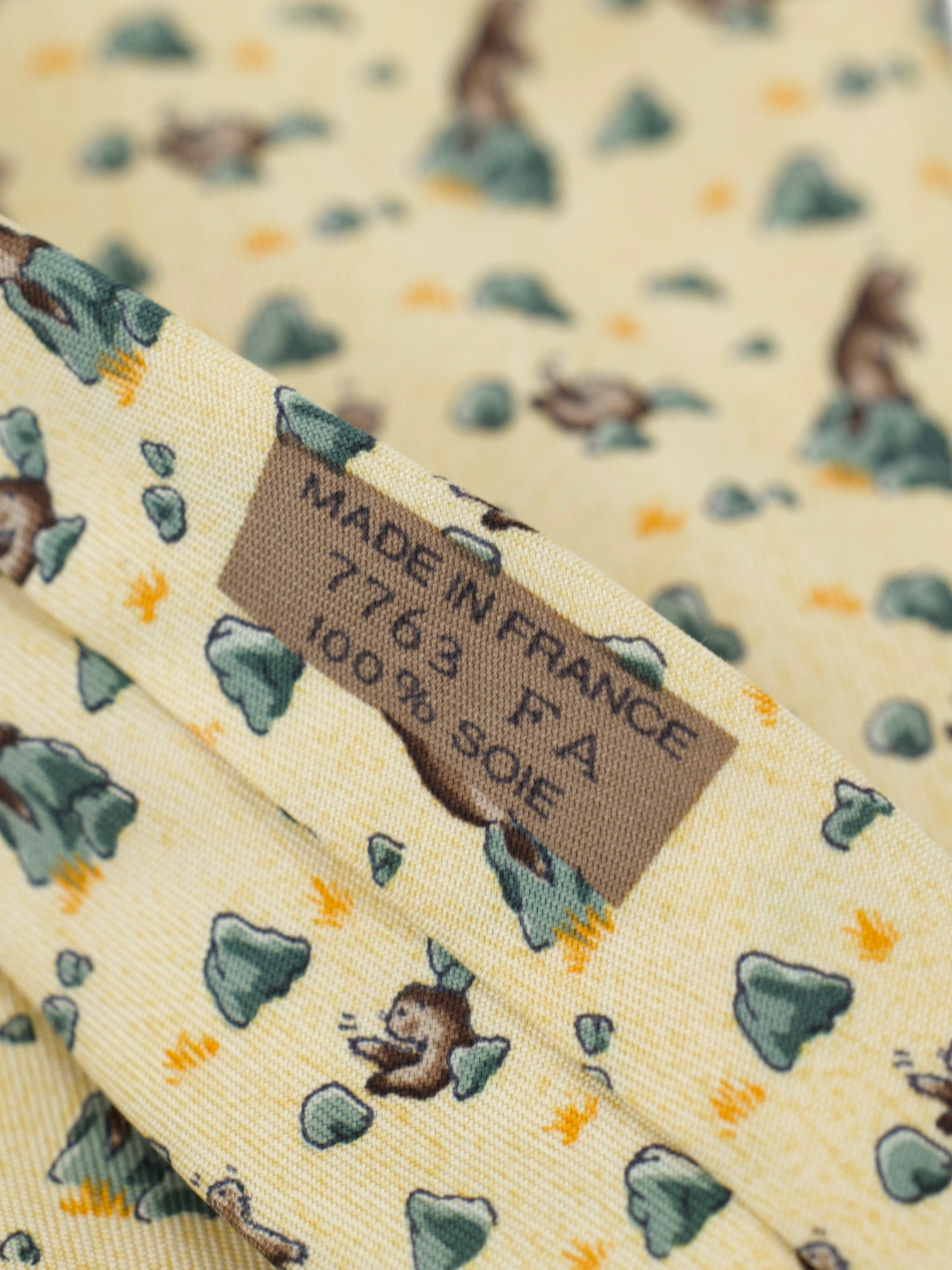 Hermès Beige Silk Otter-Motif Tie