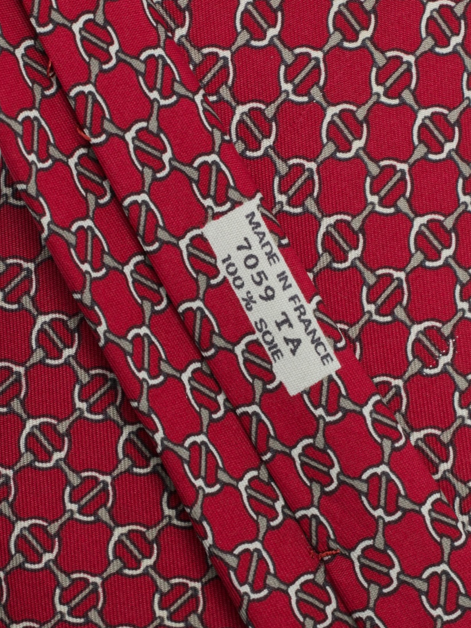 Hermès Dark Red Silk Horsebit Pattern Tie
